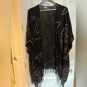 Black shawl with bronze-colored design
